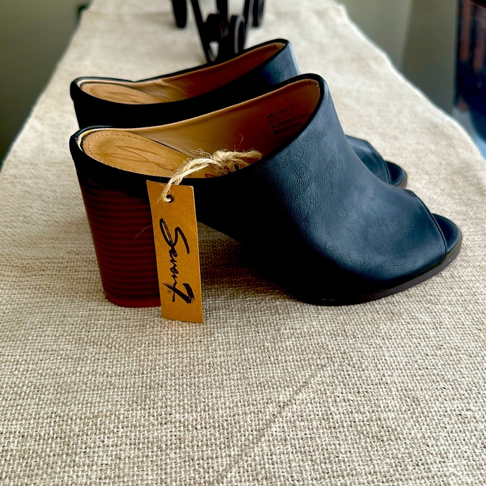 Seven7 black faux leather open toe mules. Brand new with tags.
